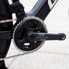 bici elettrica da corsa giant defy advanced e+ elite dettaglio guarnitura praxis in carbonio